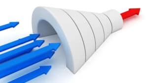 Blue arrows entering a funnel and emerging as a single red arrow, symbolizing streamlined processes or focused results. | Tsunami Reach