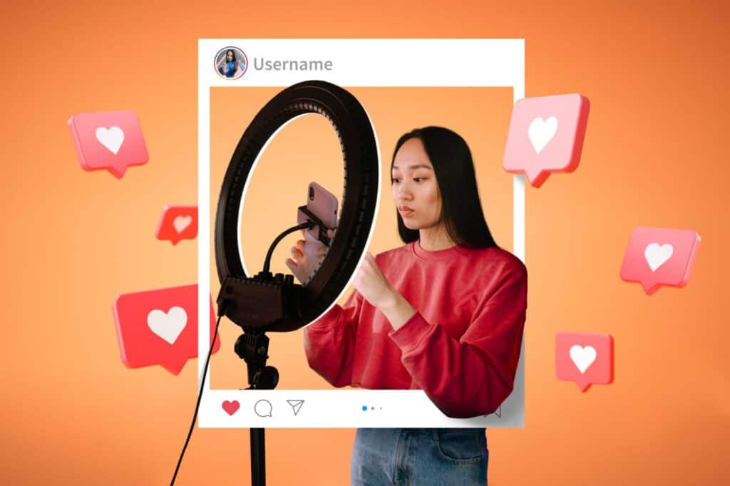 A woman sets up a phone on a ring light, framed by a social media post with floating like icons on an orange background. | Tsunami Reach