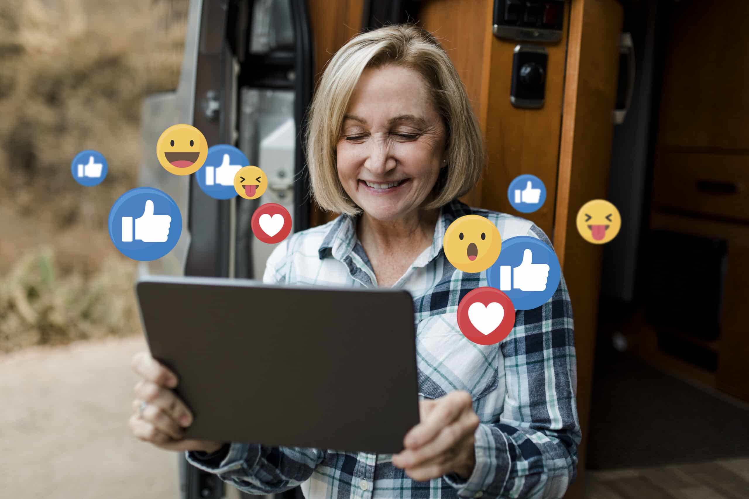 Smiling woman using a tablet, surrounded by social media icons, illustrating effective content strategy. | Tsunami Reach